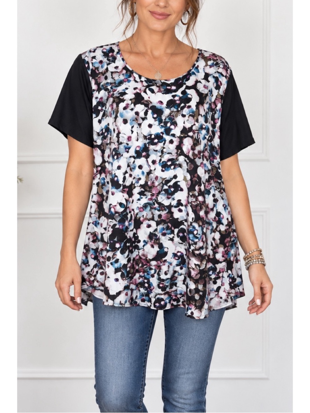Charlie Jade stylish abstract floral tunic top features a soft, flowy silhouette